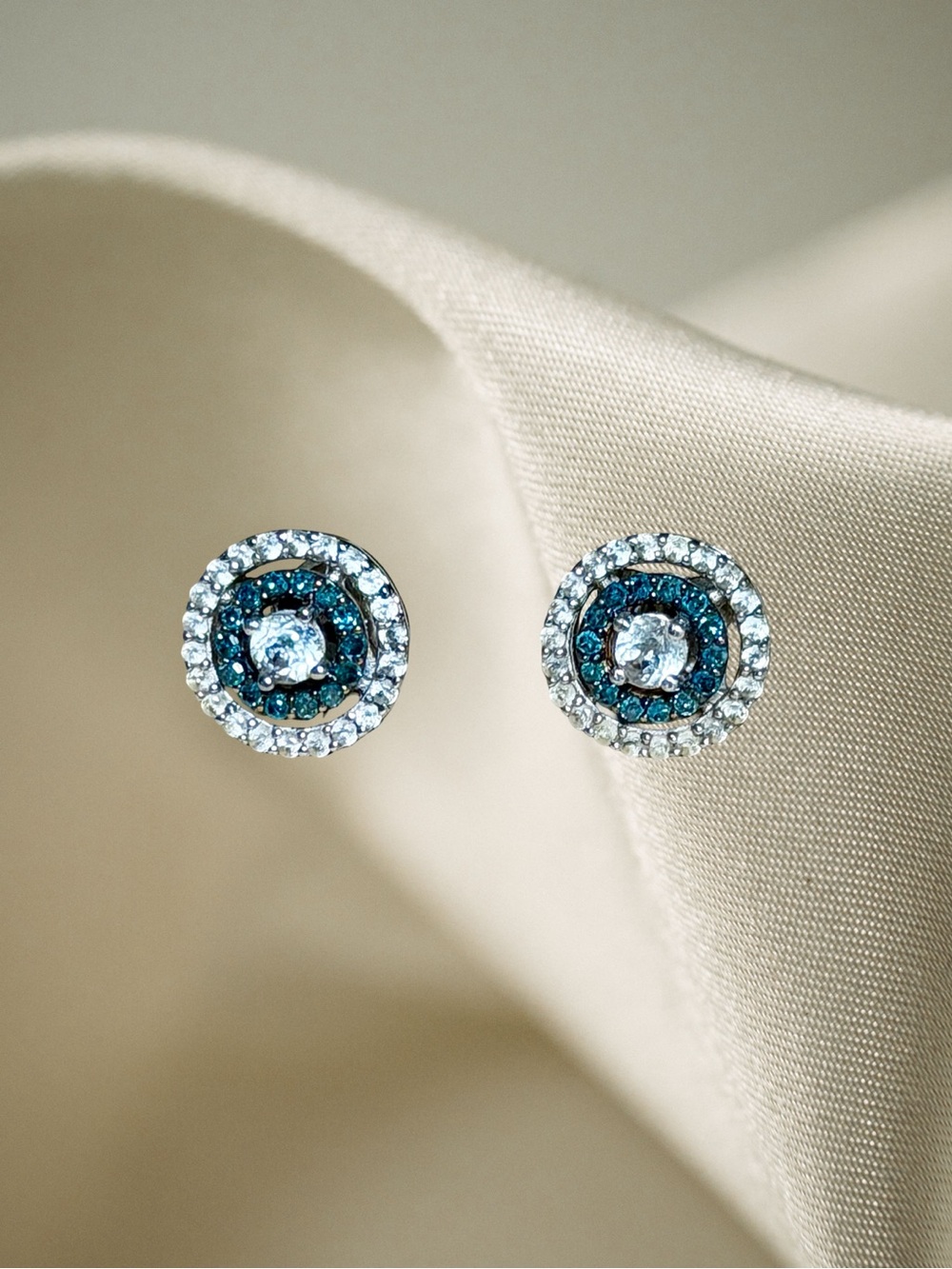 Sterling Silver White Zircon & Blue Diamond Stud Earrings.25 tcw.